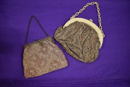 Two evening bags, including early 20th century paisley beaded bag with synthesized ivory handle.