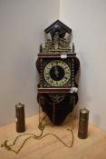 A mid-20th Century Dutch Atlas pendulum wall clock of Zaandam Zaanse style, measuring 50cm tall,