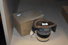 A Henley 8-37 gas mask with box