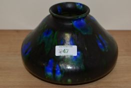 A Minton Hollins & Co Astra Ware pottery vase, c.1920s, in a mottled dripped glaze, and measuring