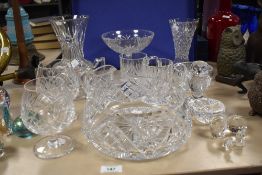 An assorted collection of cut glassware, to include brandy balloons, vases, a teapot, a Sevres glass