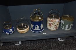 A collection of biscuit barrels and sugar bowls, including Adams and Wedgwood jasper ware, and blush