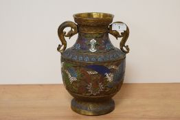 A Japanese brass cloisonné vase, having bird and foliate decoration, with scrolled handles to