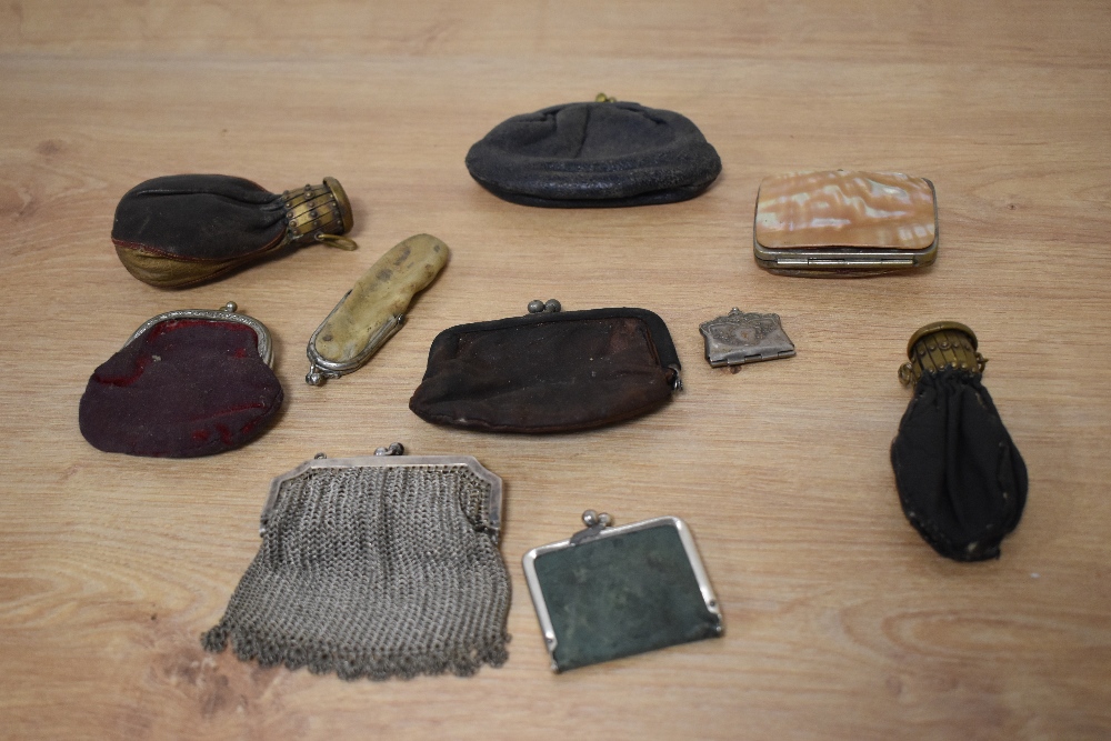 A box of Victorian ladies leather purses, a mother of pearl and white metal purse, and others