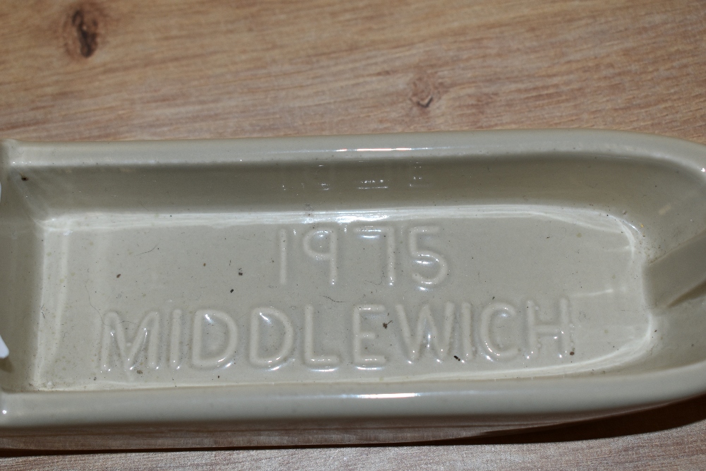 A ceramic tug, having hand painted floral detail and impressed with 1975 Middlewich. - Image 2 of 2