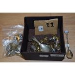 A selection of vintage Lancashire constabulary buttons, a caddy spoon and a 925 silver spoon with