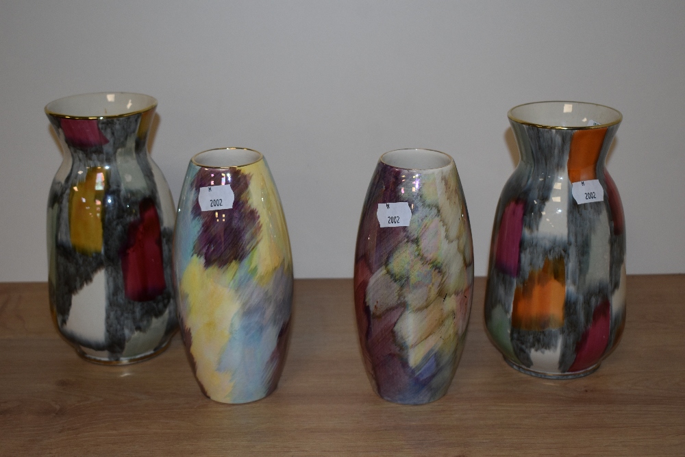 Two West German vases and two J Fryers old court vases, all having colourful lustre glazes.