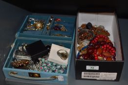 A small collection of vintage costume jewellery, including early plastic cherry amber effect beads
