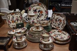 A large collection of Mason's Mandalay patterned tableware, including teacups, saucers, coffee