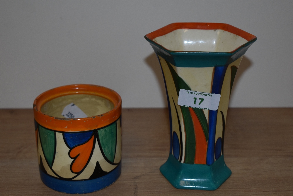 A hand painted Clarice Cliff 'Bizzare' preserve pot, void of lid sold with a similarly styled