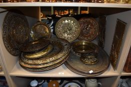 A selection of vintage embossed brass plaques etc