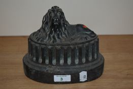 A Victorian copper jelly mould, having recumbent lion to top.