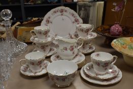 A Dutchess Bone China 'June Boquet' pattern teaset for six, lacking teapot