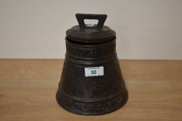 An early 20th century Huntley and Palmer biscuit tin in the firm of a bell 'When ye doe ringe I