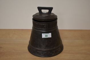 An early 20th century Huntley and Palmer biscuit tin in the firm of a bell 'When ye doe ringe I