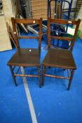 A pair of Victorian bedroom chairs having later plywood seats