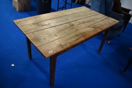 A traditional plank top provincial farmhouse style kitchen dining table, approx. 149 x 83cm