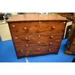 A Victorian mahogany mule style chest of drawers with lift lid over faux drawer and three lower
