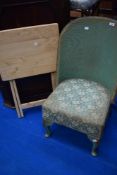 A woven fibre bedroom chair and folding beech occasional table