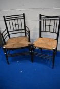 Two Arts and Crafts chairs in the style of William Morris of Sussex, having ebonised finish and rush