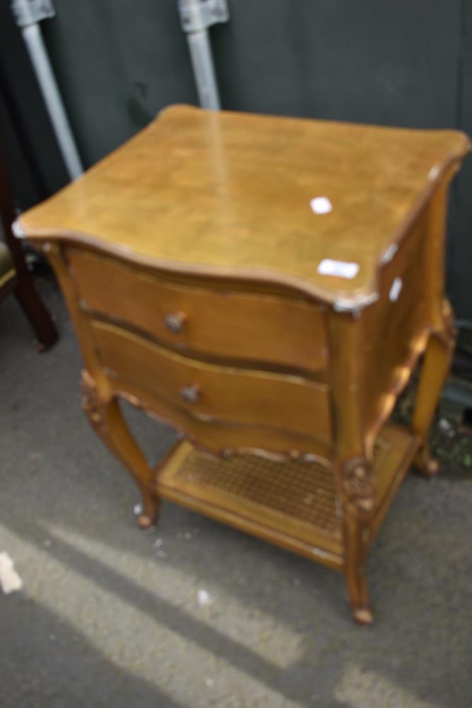 A French style gilt wood side cabinet with cane undertier