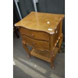 A French style gilt wood side cabinet with cane undertier