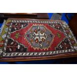 A traditional prayer rug, approx. 88 x 52cm