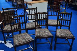 A set of six (four plus one) Priory or dark Ercol style dining chairs