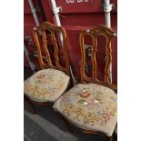 A pair of Continental style stained frame dining chairs