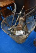 A selection of miscellaneous metal works etc including fire basket, horse hames, tilly lamp etc