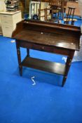 A reproduction Victorian style wash stand in dark stain