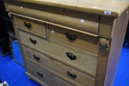 A Victorian stripped pine Scotch style chest of one faux over two short and three long drawers