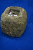 A small antique sandstone weight block