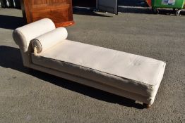 A late 19th or early 20th Century chaise longue having later upholstery