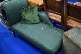 A Victorian chaise longue having later green upholstery