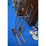 A vintage piano or similar moving trolley, with revolving stair wheels