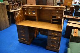 A substantial reproduction golden oak roll top desk, lock stamped county desks, width approx.153cm