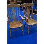 A pair of traditional beech kitchen carver chairs