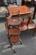 An early 20th Century mahogany folding cake stand and two occasional tables