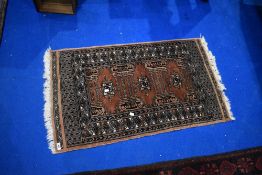 A traditional Persian style fireside rug or prayer mat