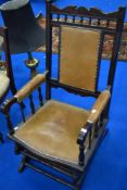 A Victorian stained frame American style rocking chair