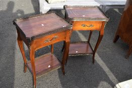 A pair of reproduction mahogany galleried side tables