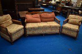 An early 20th Century stained frame and bergere cane three piece suite (af)