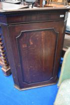 A 19th Century oak and mahogany corner cupboard