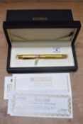An Onoto University of Cambridge limited edition fountain pen 5/100 in vermail 23ct gold plate on