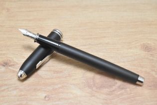 A Cross plunger fill fountain pen in matt black having Cross M nib