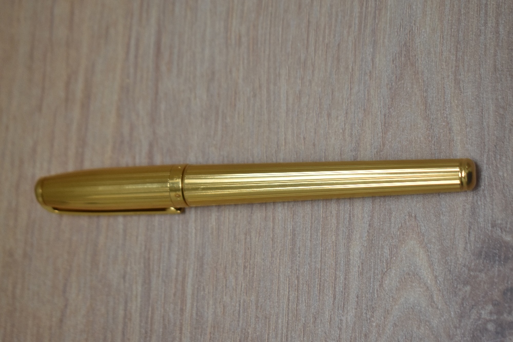 A boxed S T Dupont Fidelio gold plated cartridge fountain pen having 14k Dupont nib - Image 4 of 4