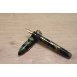 A National Pen Products The Lincoln pen a lever fill fountain pen in green marble with three