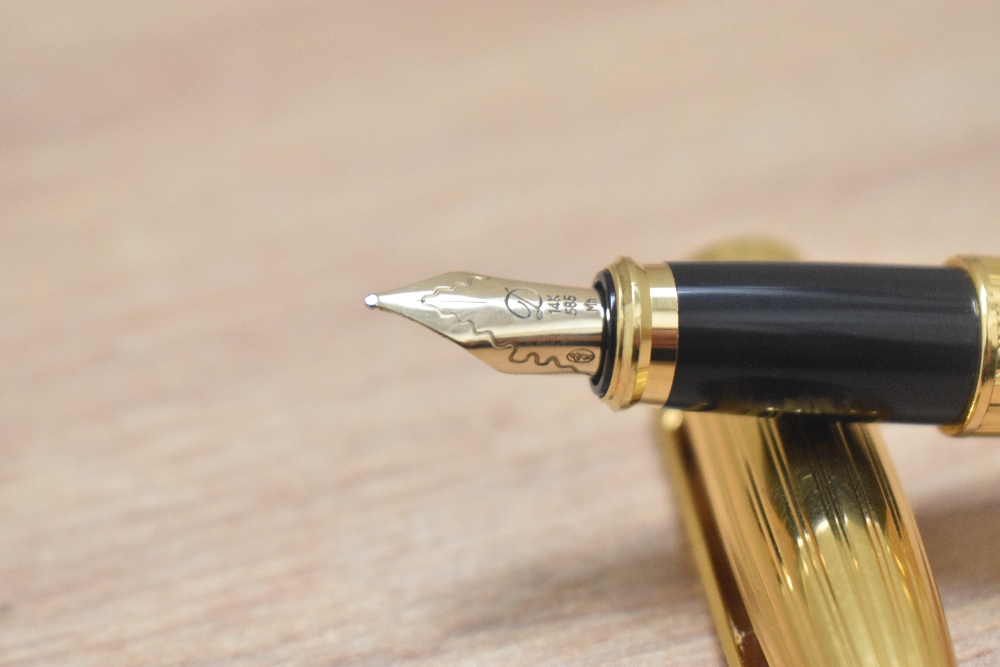 A boxed S T Dupont Fidelio gold plated cartridge fountain pen having 14k Dupont nib - Image 3 of 4