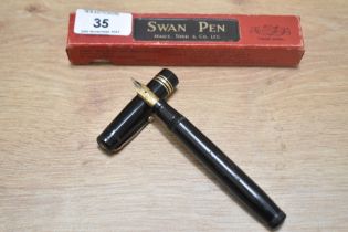 A boxed Mabie Todd Swan Leverless twist fill fountain pen in black with one broad and two narrow